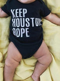 KEEP HOUSTON DOPE ONESIE